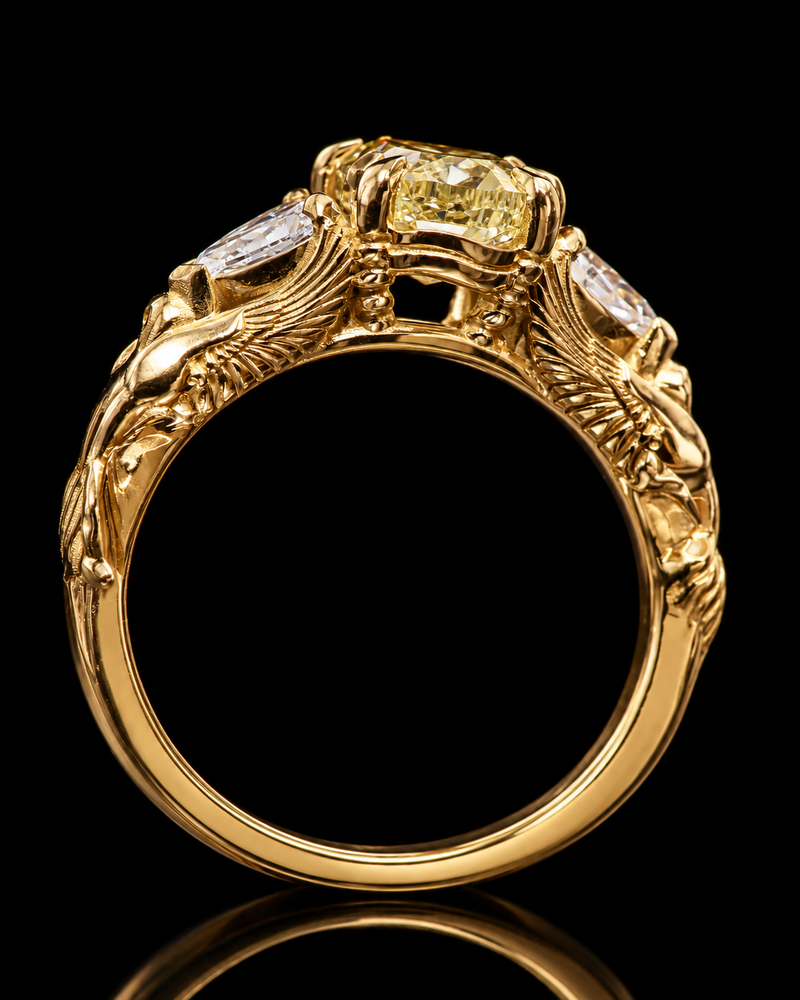 One-of-a-kind custom gold engagement ring with yellow diamond and two birds, handmade in Dublin