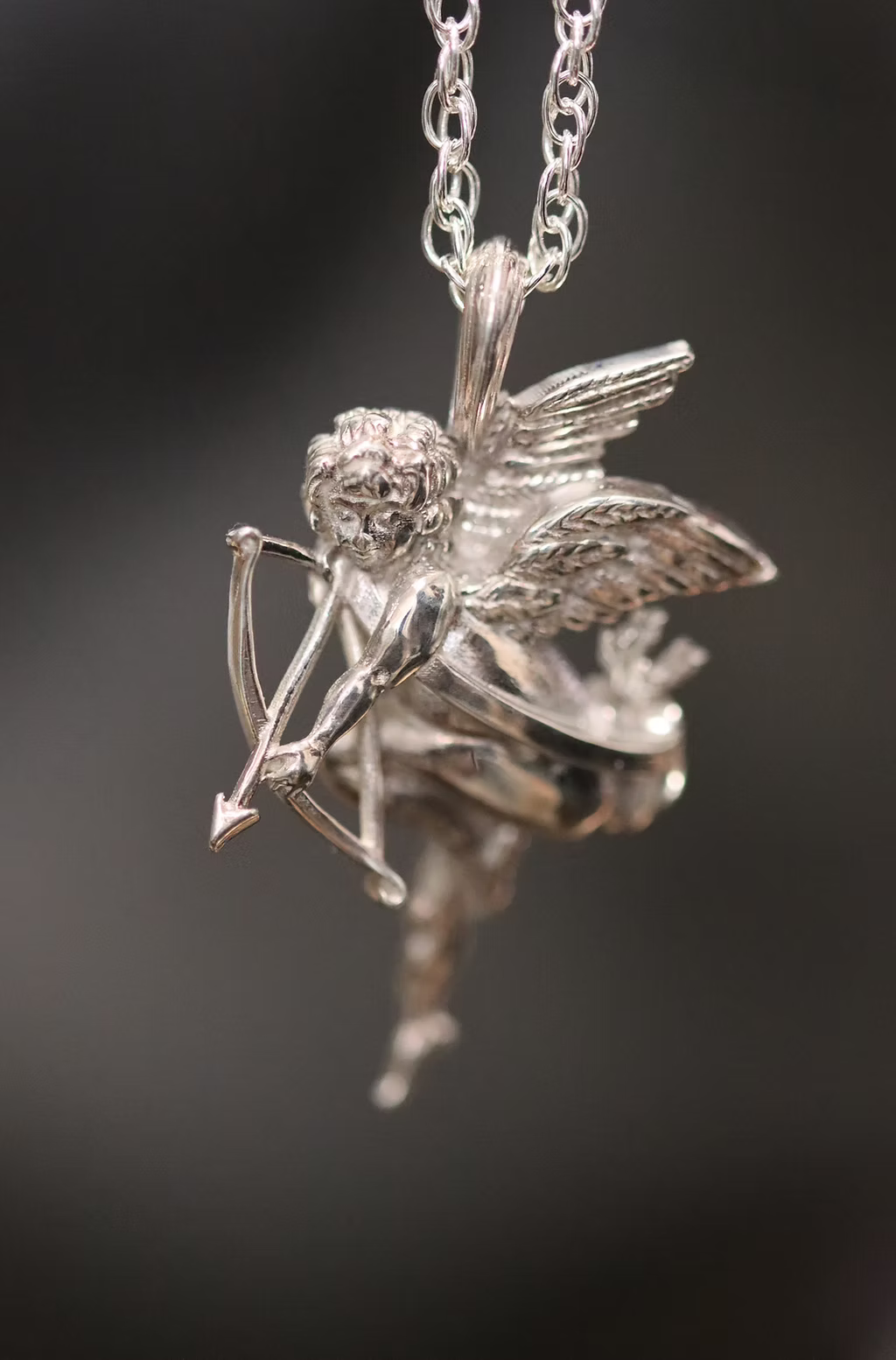 Silver cherub pendant and chain